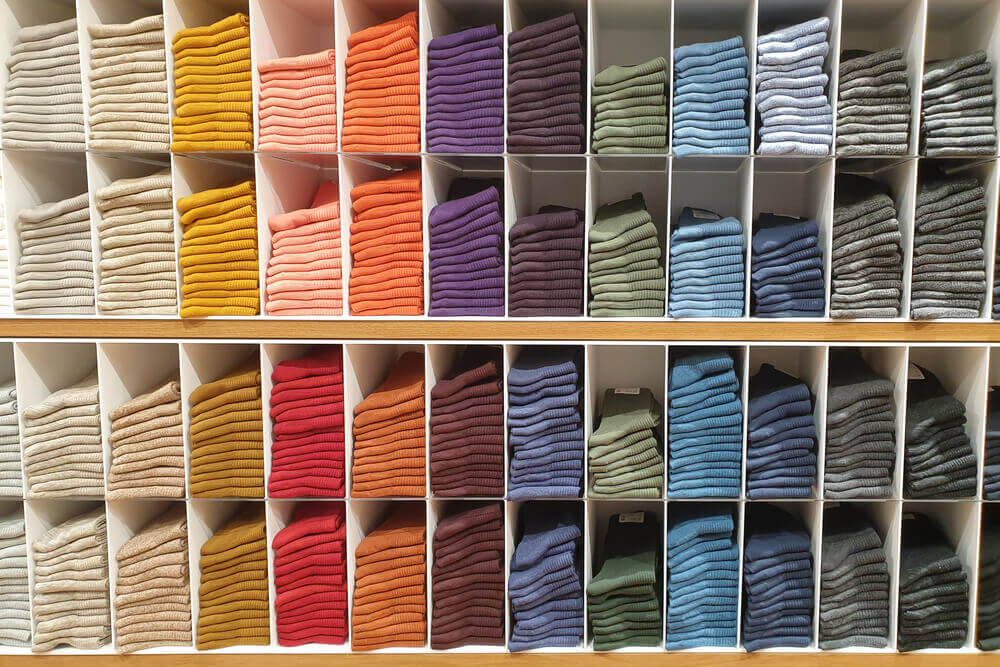 View of colorful private-label socks selling at a store.