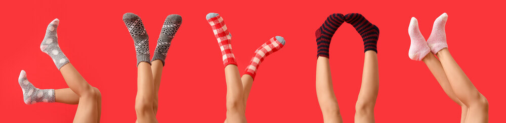 Women’s legs in colorful socks made by a private label manufacturer. 